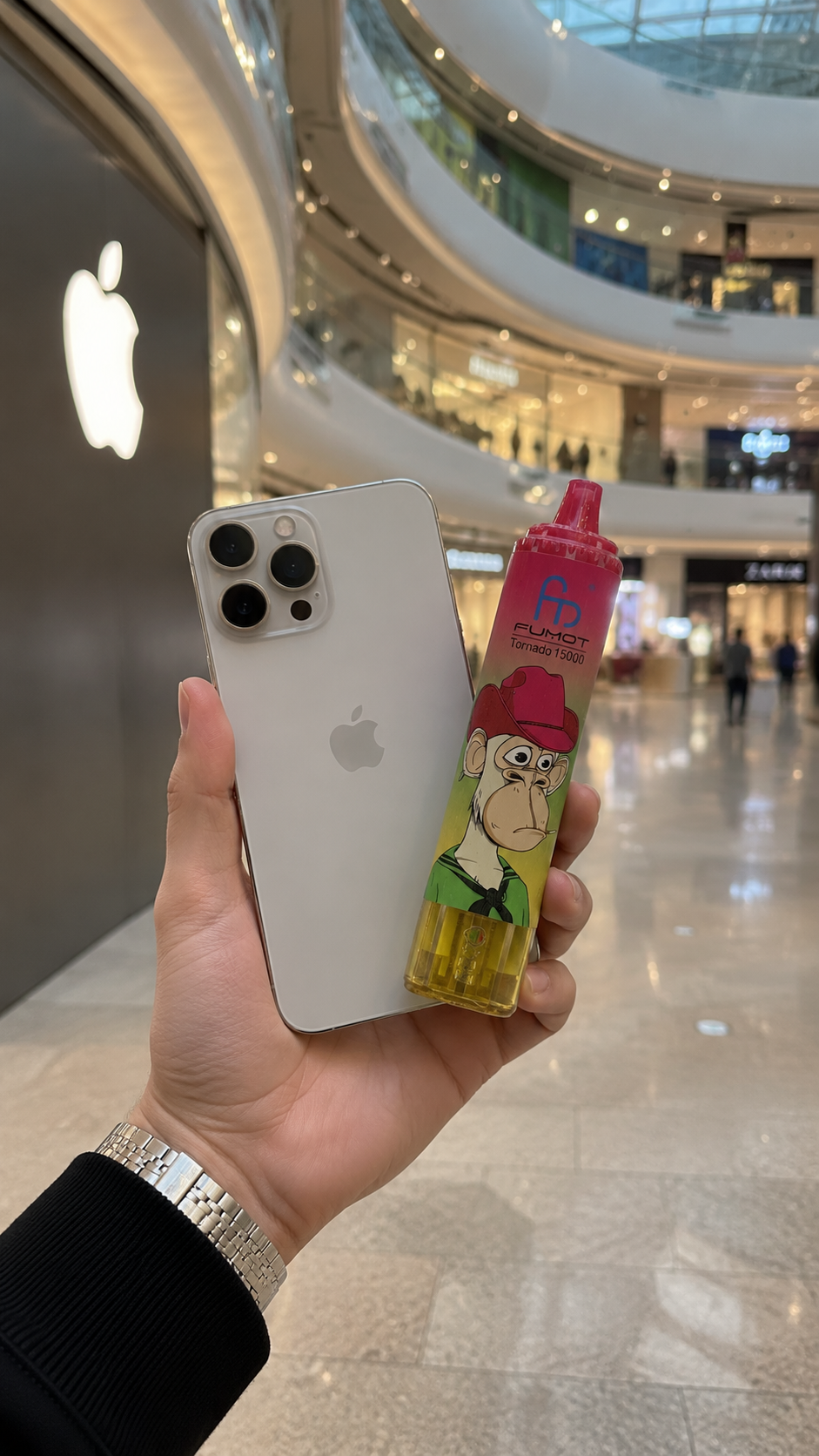 FUMOT Tornado 15000 Size Comparison with iPhone